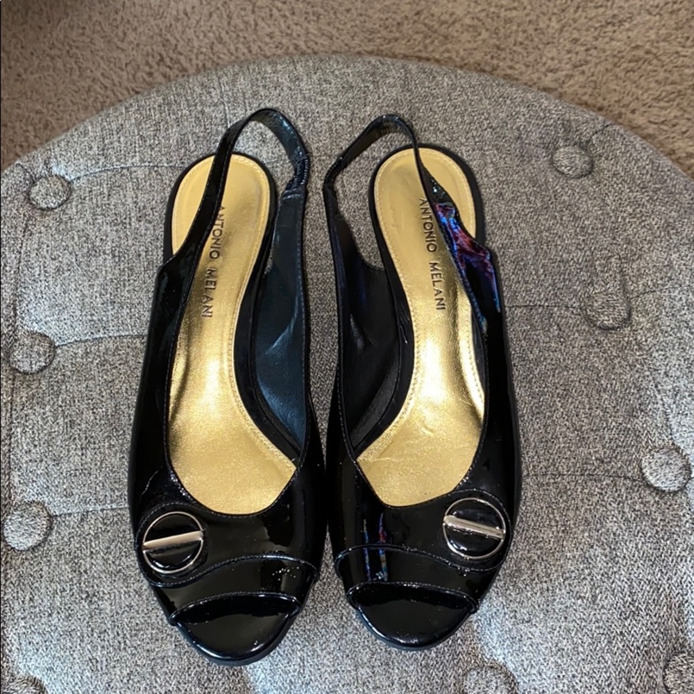 Black patent peep toe shoes